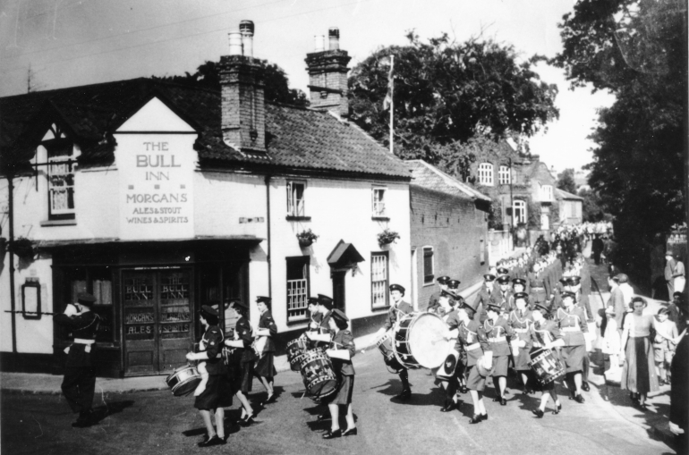 Photograph. Battle of Britain parade along Grammar School Road (North Walsham Archive).
