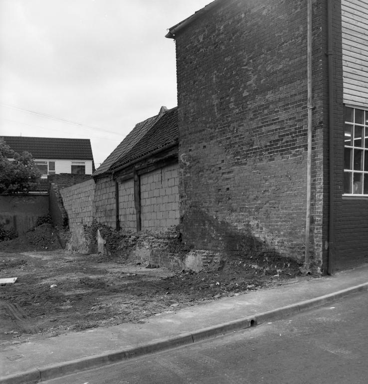 Photograph. Demolition of buildings on corner of Mundesley Road and Vicarage Street (North Walsham Archive).
